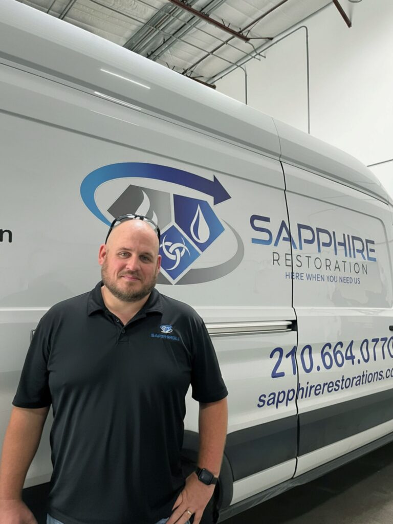 Yeshiah, owner of Sapphire Restoration, with the company van